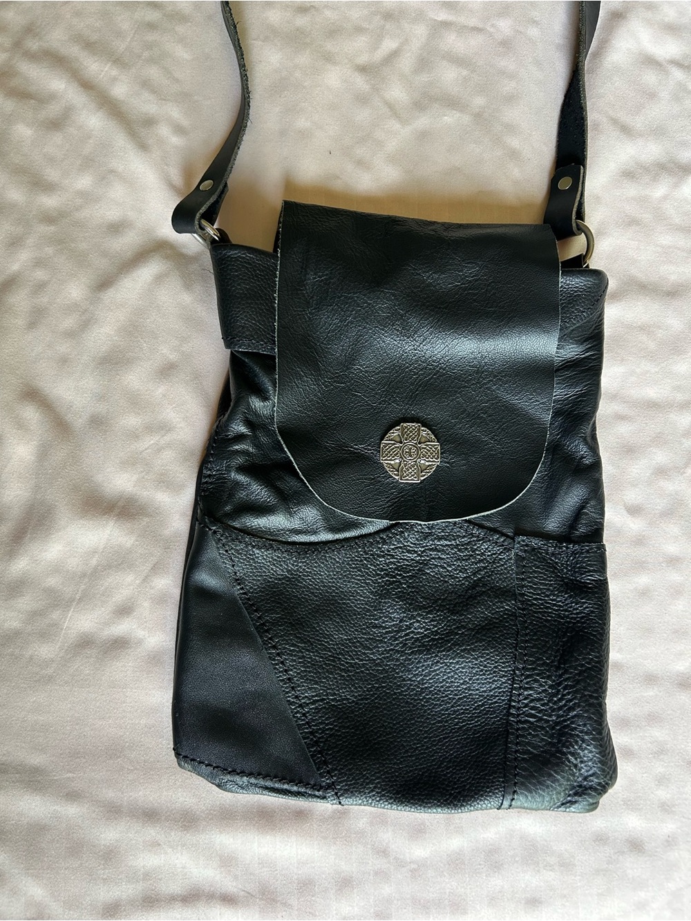 Black Leather Crossbody Bag with Decorative Celtic Medallion